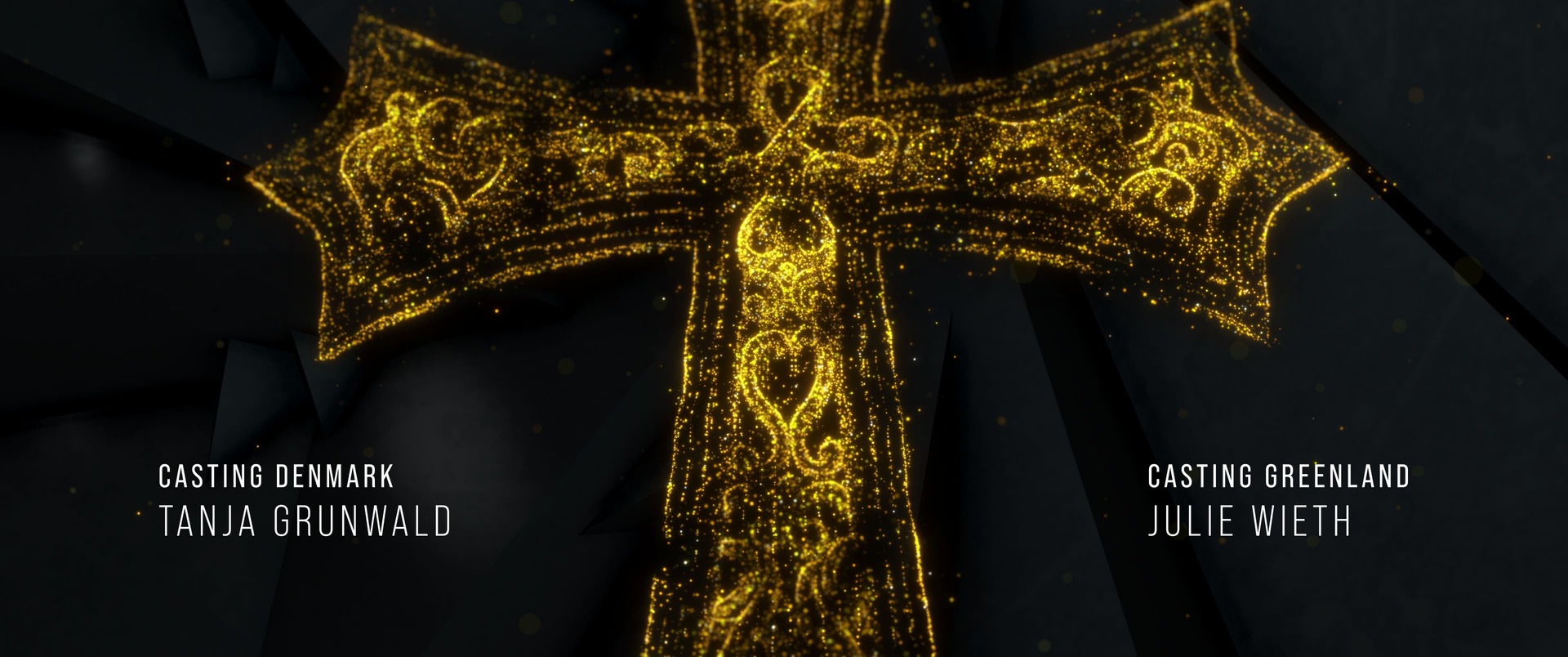 Leuchtendes Kreuzmotiv aus goldenen Partikeln in den Credits von Folge 1.
